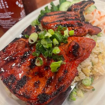 New Saigon - a plate of grilled meat and rice - Vietnamese Near Me - Bakersfield, California New Saigon - a plate of grilled meat and rice - Vietnamese Near Me - Bakersfield, California