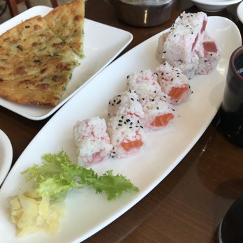 Hunan Dynasty - Sushi salmon roll and a tuna roll reversed. - Japanese Near Me - East Meadow, New York Hunan Dynasty - Sushi salmon roll and a tuna roll reversed. - Japanese Near Me - East Meadow, New York