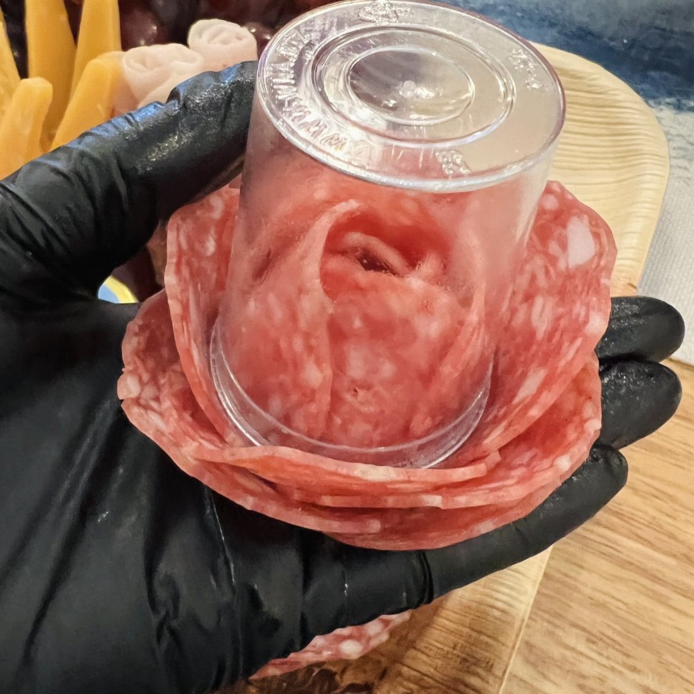 Bubbly & Bleu - Learning to make a rose out of meats. Gloves provided for sanitary purposes! Love that. - Cheese Shops Near Me - Honolulu, Hawaii Bubbly & Bleu - Learning to make a rose out of meats. Gloves provided for sanitary purposes! Love that. - Cheese Shops Near Me - Honolulu, Hawaii