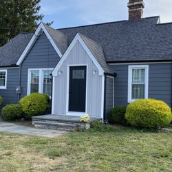 TL Home Improvement - James Hardie Siding installation with Black Gutters