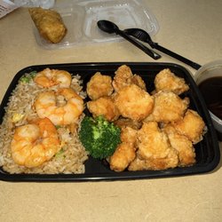 Asian Wok - Shrimp fried rice with orange chicken sauce on the side Taste so good and good portion.