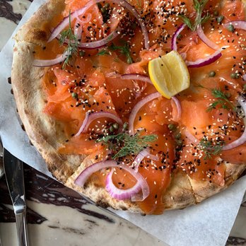 Great White - Salmon pizza is a must! The crème fraiche spread underneath the smoked salmon with all the goodies on top? Chefs kiss - New American Near Me - Los Angeles, California