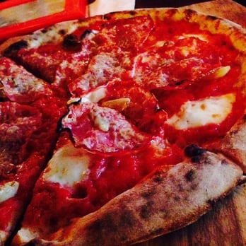 Falora - Cura pizza, had sopressata and whole roasted garlic cloves - Pizza Near Me - Tucson, Arizona Falora - Cura pizza, had sopressata and whole roasted garlic cloves - Pizza Near Me - Tucson, Arizona