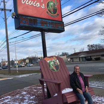 Vivio's II Food & Spirits - huge chair out front.... - Sports Bars Near Me - Warren, Michigan