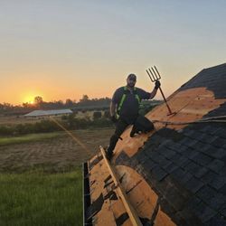 Daniel’s Roofing - Foreman Branden working late on a roof tear off.
