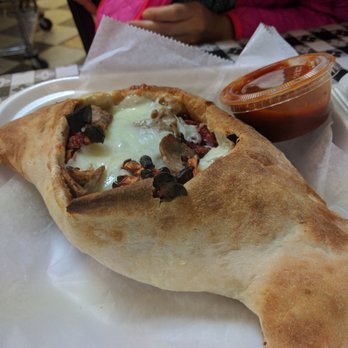Rosa's Pizza - Calzone. Good enough for 2 of us. - Pizza Near Me - Atlanta, Georgia Rosa's Pizza - Calzone. Good enough for 2 of us. - Pizza Near Me - Atlanta, Georgia