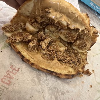 Tropical Smoothie Cafe - PEANUT BUTTER BANANA CRUNCH FLATBREAD - Juice Bars & Smoothies Near Me - Henderson, Nevada Tropical Smoothie Cafe - PEANUT BUTTER BANANA CRUNCH FLATBREAD - Juice Bars & Smoothies Near Me - Henderson, Nevada