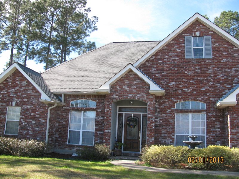 Slide of Magnolia Roofing