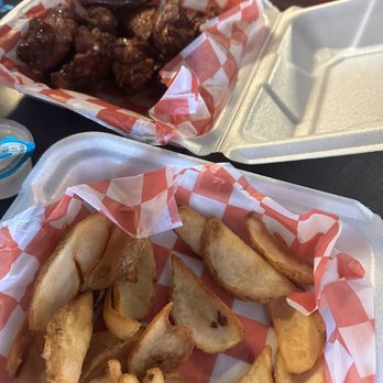 Buster's Brick House Pizza - Side of fries with Habanero wings - Pizza Near Me - Panama City Beach, Florida Buster's Brick House Pizza - Side of fries with Habanero wings - Pizza Near Me - Panama City Beach, Florida