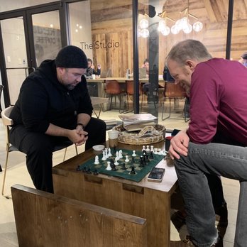 Redefined Coffee House - Chess at the table next to us. - Coffee & Tea Near Me - Grapevine, Texas Redefined Coffee House - Chess at the table next to us. - Coffee & Tea Near Me - Grapevine, Texas