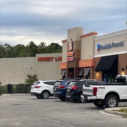 Dunkin' - Parking lot to front door