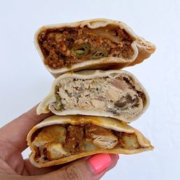 Empanadas, top to bottom: Argentinian Beef, Chicken Mushroom, Chicken Curry | $4.95 each (not warmed up yet) Empanadas, top to bottom: Argentinian Beef, Chicken Mushroom, Chicken Curry | $4.95 each (not warmed up yet)