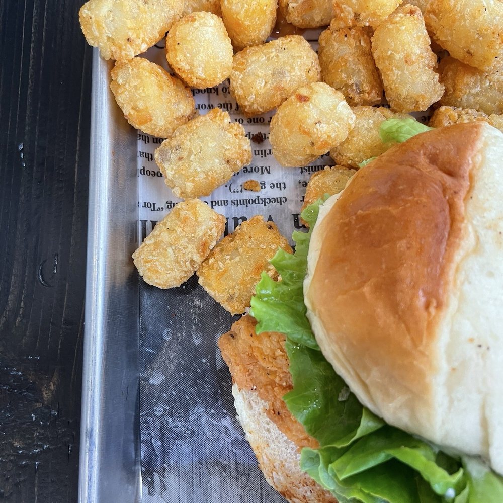 Fourths IV - Crispy chicken sandwich with tots - Burgers Near Me - Austin, Texas Fourths IV - Crispy chicken sandwich with tots - Burgers Near Me - Austin, Texas