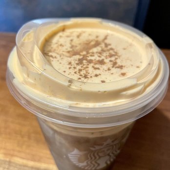 Starbucks - a cup of coffee with whipped cream - Coffee & Tea Near Me - Orlando, Florida