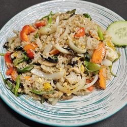 Basil Fried Rice, Chicken, Lunch Portion. Our lunch entrées include a complimentary spring roll. Join us today for great Thai Food.
