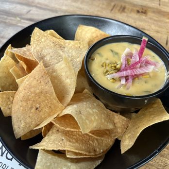 Long Weekend - Liquid gold queso - New American Near Me - Houston, Texas