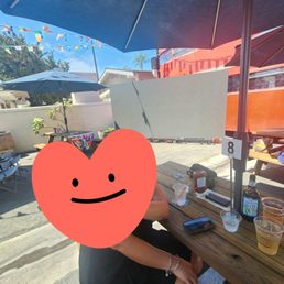 Wife and I on patio in front of large TV for world cup match