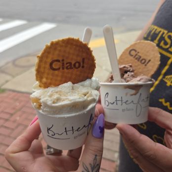 Butterfat - Pictured chocolate (right) & half coconut cake and half cinnamon bread (left) topped with wafer cookie & glitter. - Gelato Near Me - Pittsburgh, Pennsylvania Butterfat - Pictured chocolate (right) & half coconut cake and half cinnamon bread (left) topped with wafer cookie & glitter. - Gelato Near Me - Pittsburgh, Pennsylvania
