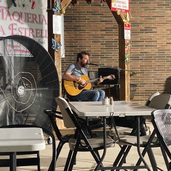 Taqueria La Estrella - a man playing a guitar - Mexican Near Me - Mineral Wells, Texas