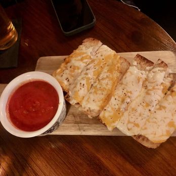 Casey's Irish Pub - "Grilled Cheese & Tomato Soup" wasn't grilled cheese at all haha. It's French bread w/ cheese and marinara sauce. - Pubs Near Me - Los Angeles, California Casey's Irish Pub - "Grilled Cheese & Tomato Soup" wasn't grilled cheese at all haha. It's French bread w/ cheese and marinara sauce. - Pubs Near Me - Los Angeles, California