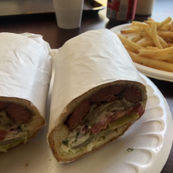 Persepolis Pizza & Subs - The food was AMAZING!!!! Premium Sosees 'hot hog' sandwich and fries - Pizza Near Me - Reseda, California Persepolis Pizza & Subs - The food was AMAZING!!!! Premium Sosees 'hot hog' sandwich and fries - Pizza Near Me - Reseda, California