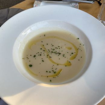 Nell's Restaurant - Celery root soup with truffle oil and chives - New American Near Me - Seattle, Washington Nell's Restaurant - Celery root soup with truffle oil and chives - New American Near Me - Seattle, Washington