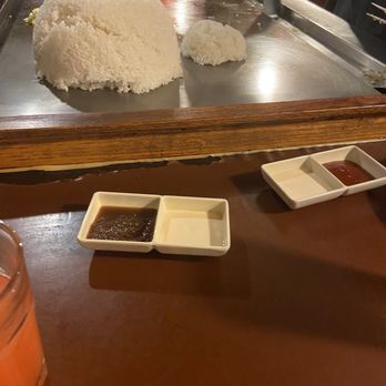 Shogun Japanese Steakhouse - Sauces and rice on cooker - Steakhouses Near Me - St. Charles, Missouri Shogun Japanese Steakhouse - Sauces and rice on cooker - Steakhouses Near Me - St. Charles, Missouri