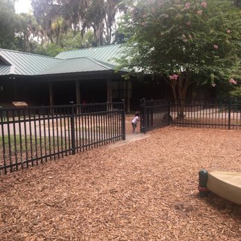 Palm Coast Linear Park - View of the covered patio and restroom area. - Parks Near Me - Palm Coast, Florida Palm Coast Linear Park - View of the covered patio and restroom area. - Parks Near Me - Palm Coast, Florida
