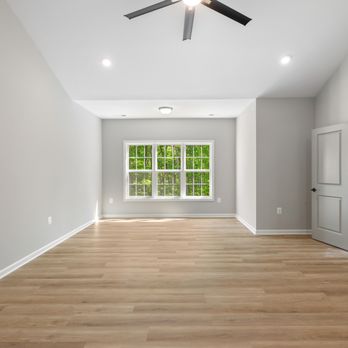 Trigon Homes - empty living room with ceiling fan - General Contractors Near Me - Culpeper, Virginia Trigon Homes - empty living room with ceiling fan - General Contractors Near Me - Culpeper, Virginia