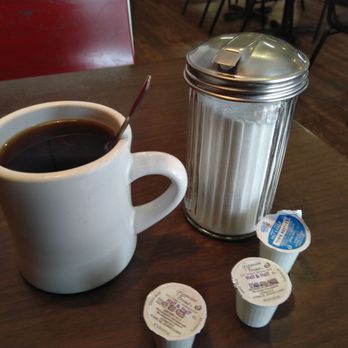 Lowesville Cafe - Coffee with sugar as God intended it: in a tall glass cylinder - Cafes Near Me - Lowesville, North Carolina