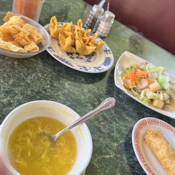 Egg Roll House - a bowl of soup and a plate of chips - Chinese Near Me - Radcliff, Kentucky