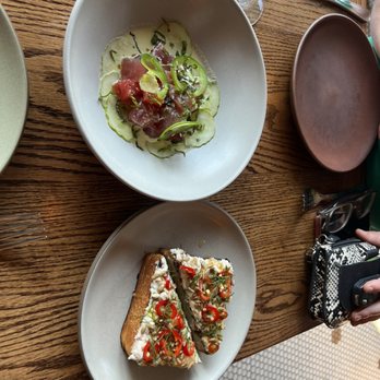 Coquette - Bass Toast and Yellow Fin and Cucumber appetizers. - New American Near Me - New Orleans, Louisiana