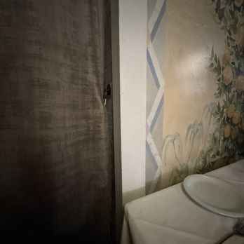 Mamma Maria - Crammed in a corner by a dirty curtain by the kitchen pass-through - Italian Near Me - Boston, Massachusetts
