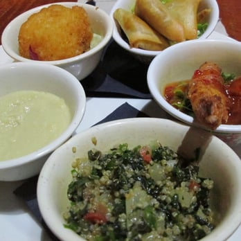 Zango - 5 different appetizers. Tabulah, hummus, vegetarian samosas, I believe the other two were a chicken ball and some shrimp. - Middle Eastern Near Me - Paris, 75