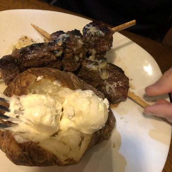 Outback Steakhouse - Roasted garlic filet medallions and baked potato - Steakhouses Near Me - Macedonia, Ohio