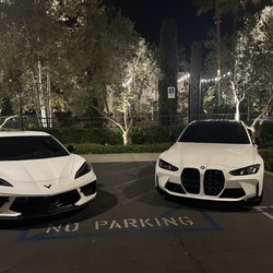 Night Delivery to Client's Address White C8 Corvette & White BMW M3