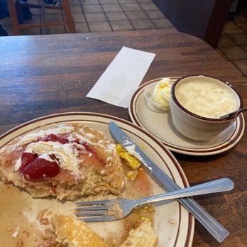 Wagon Wheel Restaurant - The strawberry pancakes with eggs sausage and grits - American Near Me - Needles, California Wagon Wheel Restaurant - The strawberry pancakes with eggs sausage and grits - American Near Me - Needles, California