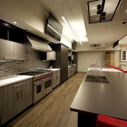 Agentis Kitchen & Bath - Our showroom's innovative "dueling kitchen" was designed for two chefs to work simultaneously for demonstrations.