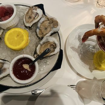 Duke's Steakhouse - Half oysters and shrimp cocktail with spiked lavender lemonade. - Steakhouses Near Me - Sparks, Nevada Duke's Steakhouse - Half oysters and shrimp cocktail with spiked lavender lemonade. - Steakhouses Near Me - Sparks, Nevada