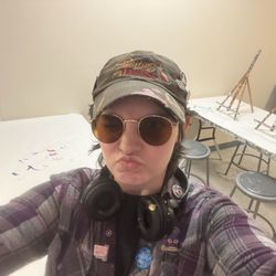 Painting with a Twist - This is our instructor E, she is wonderful and so patient.