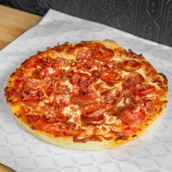 MEAT LOVERS PIZZETTE

Tomato Sauce, Pepperoni, Sausage, Bacon and Shredded Mozzarella Cheese