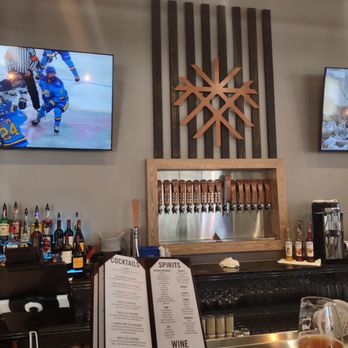 Mana Brewing - taps in between two tv's - Brewpubs Near Me - Shakopee, Minnesota