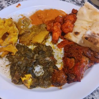 Ganesh Indian Cuisine - Some of the buffet offerings: Onion Pakora, Chicken Curry, Chili Chicken,  Nan, Tandoori Chicken,  Saag Paneer - Indian Near Me - Beaverton, Oregon