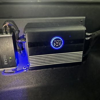 The Beat Clinic - Closer look at the mounting and containment of cable work of the amp in the frunk. - Car Stereo Installation Near Me - Las Vegas, Nevada