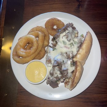 Harbor House Cafe - Philly cheese steak sandwich With onion rings - Cafes Near Me - Boulder City, Nevada Harbor House Cafe - Philly cheese steak sandwich With onion rings - Cafes Near Me - Boulder City, Nevada