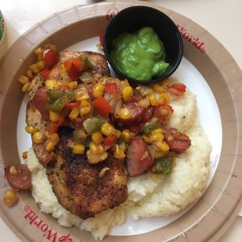 Sunshine Seasons - The grill: Salmon with Cheesy Grits and Andouille-Corn Succotash $12.99 - American Near Me - Lake Buena Vista, Florida Sunshine Seasons - The grill: Salmon with Cheesy Grits and Andouille-Corn Succotash $12.99 - American Near Me - Lake Buena Vista, Florida