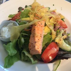 Quarter Acre Cafe - Pictures include children menu of chicken fingers and hamburgers. The artichoke dip is fantastic. Fresh deep fried nachos came with it.