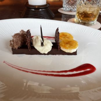 Tiffins Restaurant - South American chocolate ganache caramelize banana Cocoa nib tuile - New American Near Me - Lake Buena Vista, Florida Tiffins Restaurant - South American chocolate ganache caramelize banana Cocoa nib tuile - New American Near Me - Lake Buena Vista, Florida