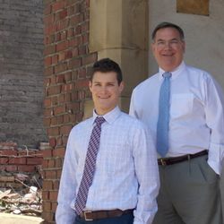 Babcock Eye Care - Drs. Babcock and Babcock standing on the steps of our old practice location.