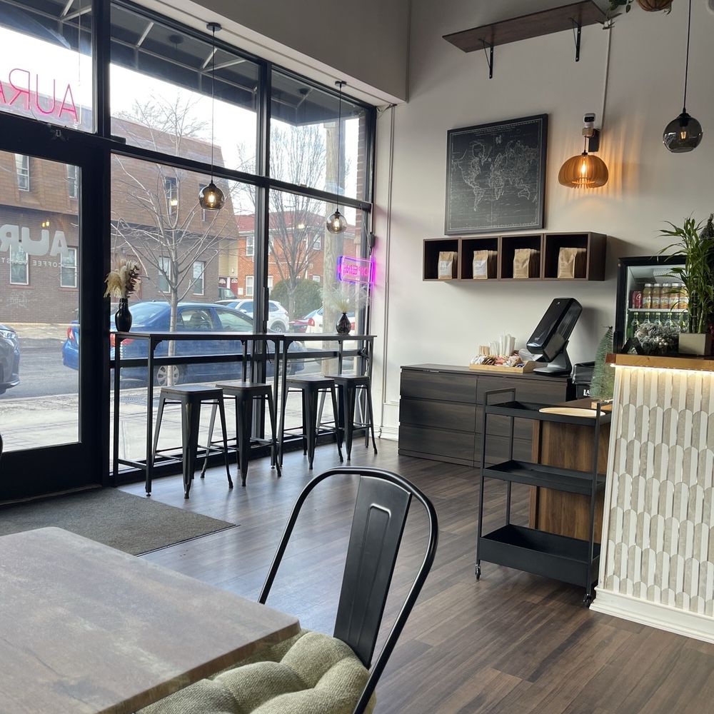 Aura Coffee Roasters - Seating - Coffee & Tea Near Me - Linden, New Jersey Aura Coffee Roasters - Seating - Coffee & Tea Near Me - Linden, New Jersey